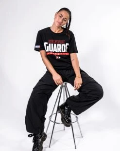 Helvetic Guards Identity T-Shirt -Football Gear Shop Merchandise 2023 BalkenFootball Black Cropped Eleni HVG Logogross T Shirt Women