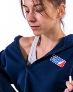 European League Of Football Iconic Zipper 8 European League Of Football Iconic Zipper -Football Gear Shop Merchandise 2023 Blue Detail ELF Logo Sarah SizeM Women Zipper